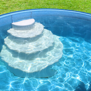 Pool Steps in Pool Grass Background
