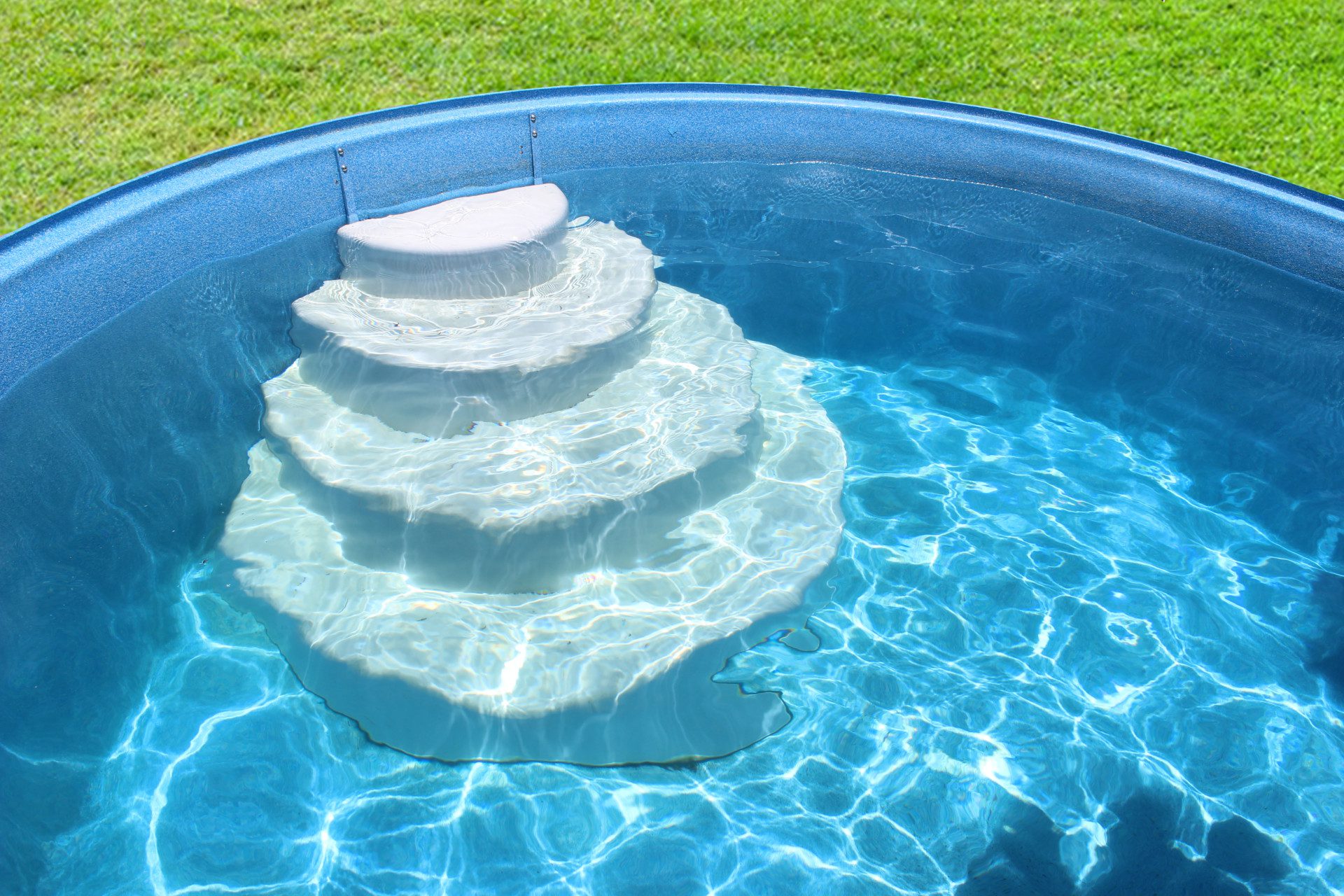 Pool Steps in Pool Grass Background