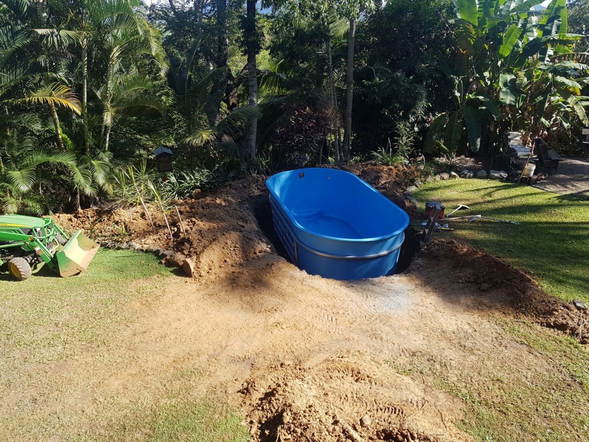 Schooner Pool being buried in backyard.