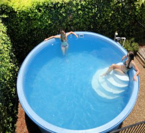 Girls lounging in Clipper Swimming Pool