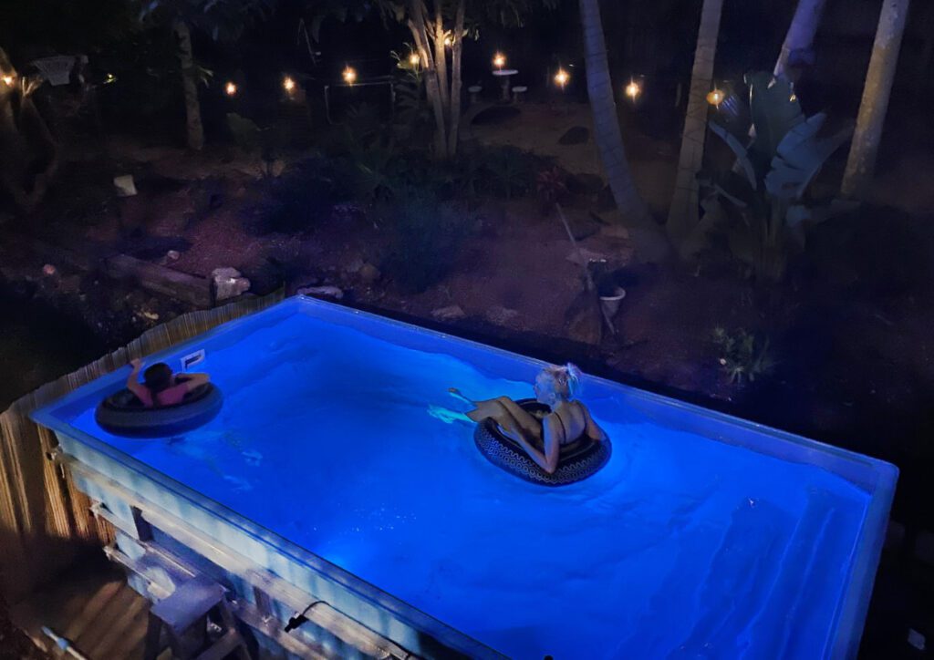 Cruiser Swimming Pool lit up at night