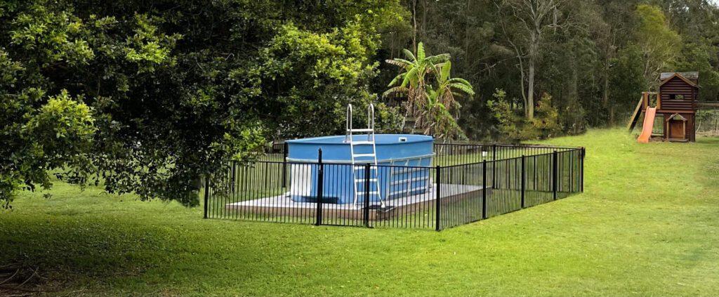 Schooner Pool in long yard photo sitting on concrete slab